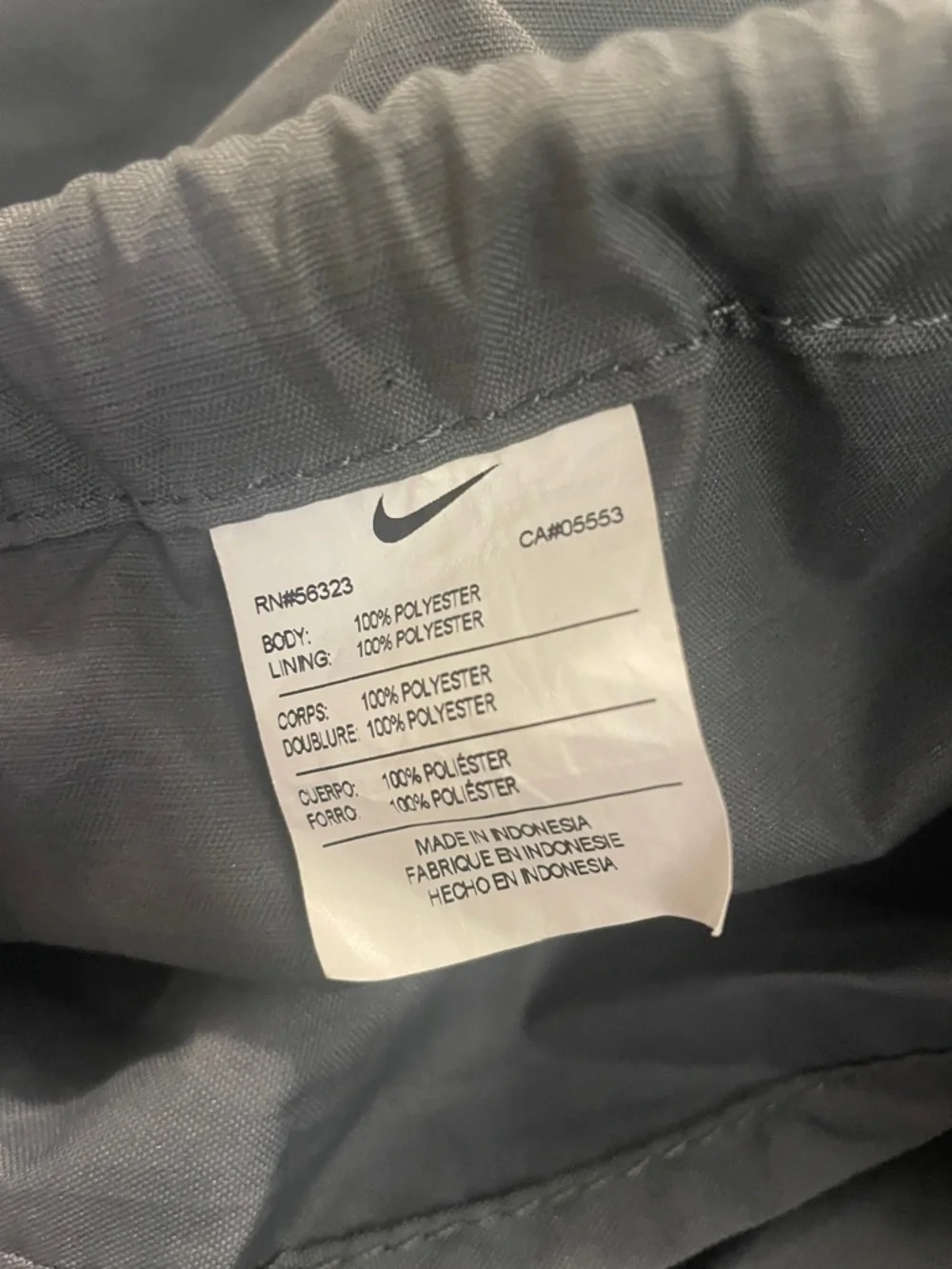 Nike Gray and Black Drawstring Backpack with White Swoosh